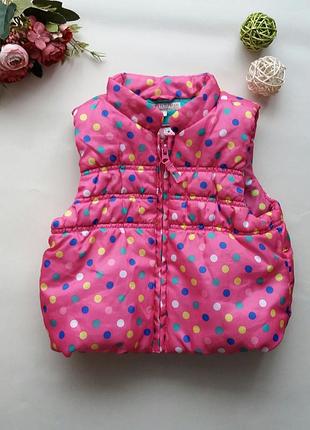 Яркая жилетка