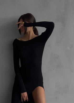 Чорна сукня,  міді , з вирізом на нозі5 фото
