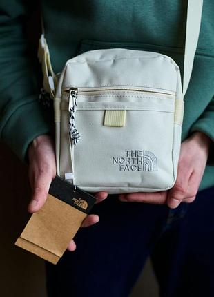 Барсетка the north face белая