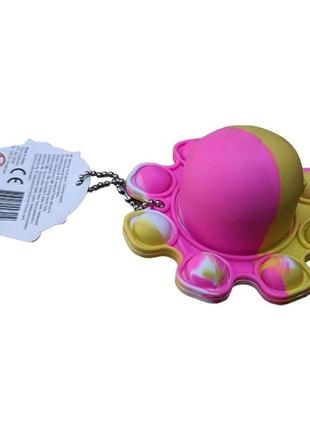 Іграшка антистрес fidget toy push flip pop it восьминіг перевертень рожевий з жовтим