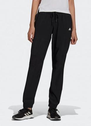 Черные женские спортивные штаны с манжетами низкая талия посадка стрейч тонкие adidas1 фото