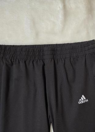 Черные женские спортивные штаны с манжетами низкая талия посадка стрейч тонкие adidas8 фото