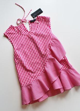 Стильная розовая блуза в клетку с воланами по низу хлопок1 фото