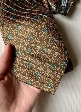 Роскошный шелковый галстук nina ricci!4 фото