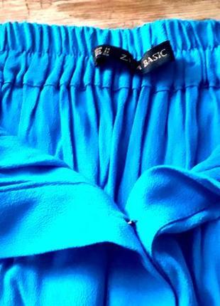 Яркая юбка на пуговицах с карманами3 фото