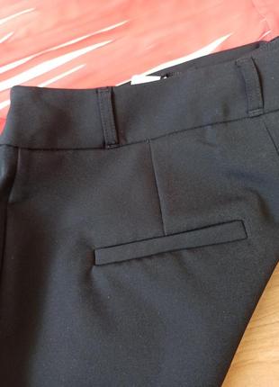 Еластичні брюки з ремнем в комплекті5 фото