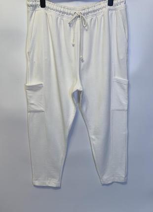 Новые брюки на флисе с карманами по бокам1 фото