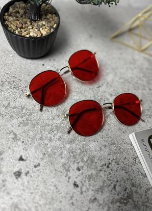 Солнцезащитные очки . красные в золотой оправе1 фото