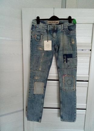 Брендовые новые красивые коттоновые джинсы р.34евро(12-14).3 фото