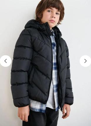 Стьобана куртка для хлопчика чорна1 фото