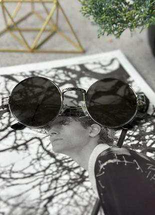 Крупные круглые солнцезащитные очки. зеркальные в серебряной оправе.2 фото