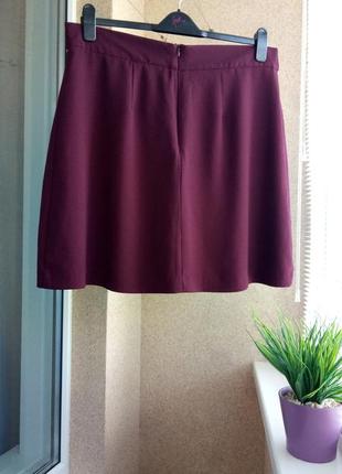 Красивая  стильная юбка цвета марсала3 фото