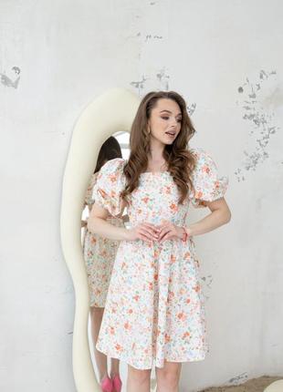 Квітчаста міні сукня з відкритою спинкою та пишною спідницею в квітковий принт3 фото
