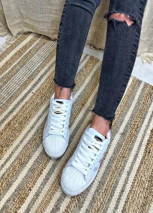 Женские белые кроссовки adidas7 фото