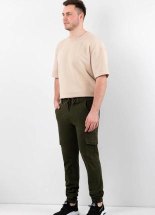Чоловічі штани кольору хакі з кишенями карго4 фото