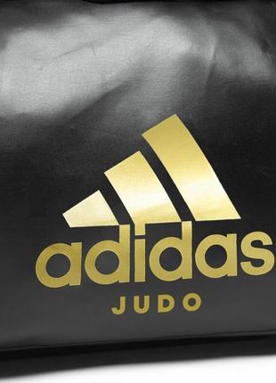 Дорожная сумка на колесах с золотыи логотипом adidas judo сумка черная спортивная на колесах большая сумка8 фото