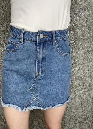 Джинсова спідниця з необробленим краєм синя3 фото