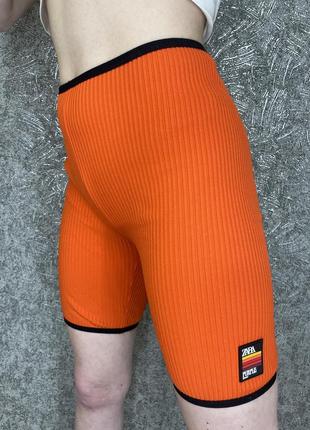 Яркие велосипедки в рубчик оранжевые