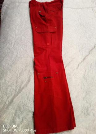 Трендовые красные джинсы карго на заниженной посадке бренда rebel.7 фото