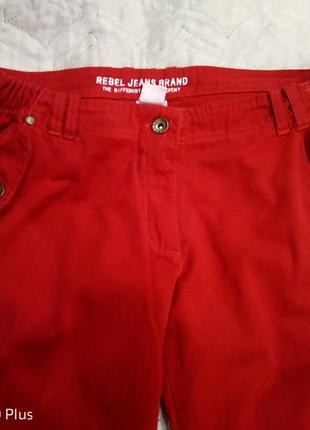 Трендовые красные джинсы карго на заниженной посадке бренда rebel.2 фото