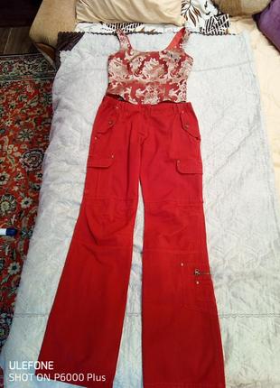 Трендовые красные джинсы карго на заниженной посадке бренда rebel.1 фото