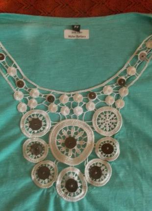 Салатовая футболка с узором  и разрезами на рукавах  muller barbara