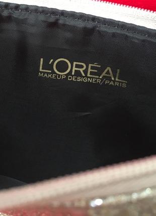 Брендова шикарна золотиста косметичка від l'oreal2 фото