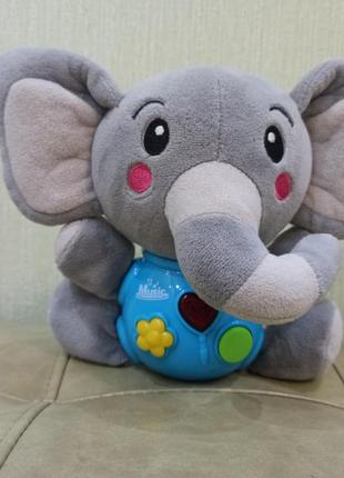 Мягкая игрушка слоненок со светом и звуком1 фото