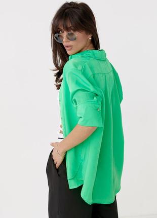 Женская блузка с укороченным рукавом.7 фото