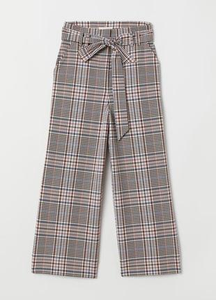 Широкие укороченные брюки в клетку h&m.