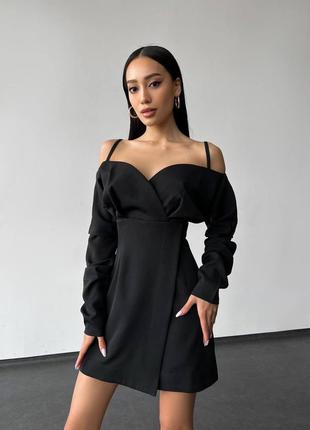 Изысканное черное платье с длинными рукавами и открытыми плечами.6 фото