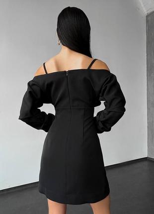 Изысканное черное платье с длинными рукавами и открытыми плечами.7 фото