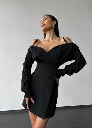 Изысканное черное платье с длинными рукавами и открытыми плечами.2 фото