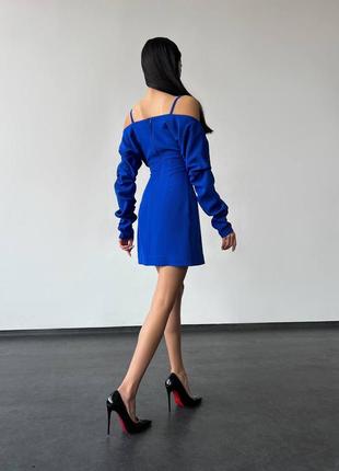 Изысканное синее электрик  платье с длинными рукавами и открытыми плечами.7 фото