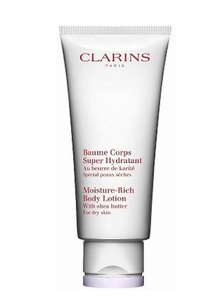 Увлажняющий лосьон для тела clarins moisture-rich body lotion, 30 мл1 фото