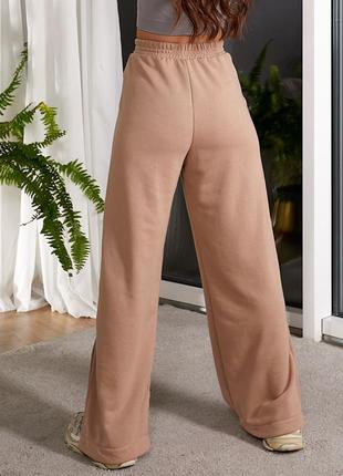 Широкие женские брюки с разрезами 4 цвета палаццо6 фото