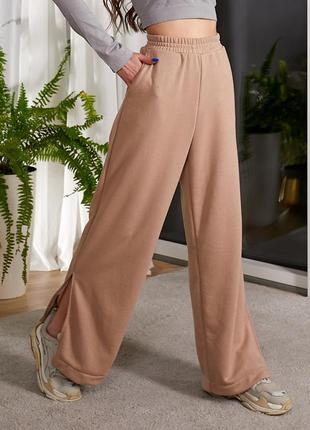 Широкие женские брюки с разрезами 4 цвета палаццо5 фото