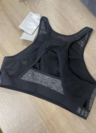 Спортивный топ puma pwrun fast bra3 фото