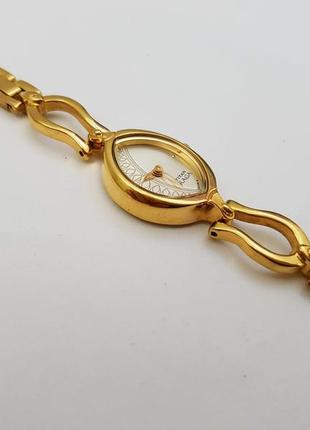 Красивий жіночий годинник titan raga, індія. позолота, кварц.