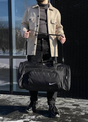 Большая дорожная/спортивная сумка выполнена из черного прочного материала 🔥2 фото