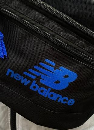 Поясная сумка бананка new balance с логотипом синего цвета3 фото