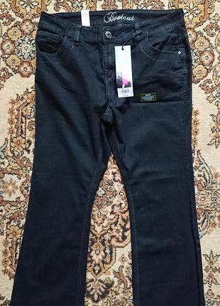 Фирменные английские демисезонные демисезонные летние стрейчевые джинсы,новые с бирками,размер 18анг.