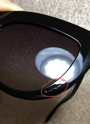 Сонцезахисні окуляри кішечки з чорною глянсовою оправою6 фото