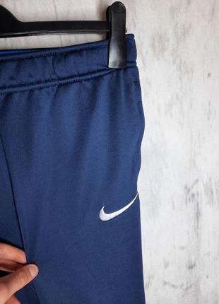 Оригинальные крутые мужские легкие красивые спортивные штаны nike dri-fit размер s3 фото