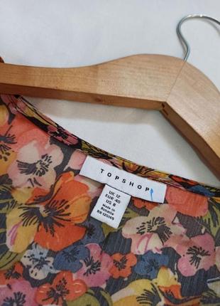 Блуза в цветочный принт с завязками спереди/с рюшами4 фото