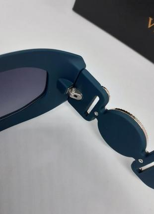 Окуляри в стилі versace сонцезахисні унісекс бірюзово сині з золотим логотипом в упаковці7 фото