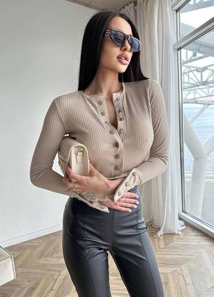 Боді в рубчик з довгими рукавами.