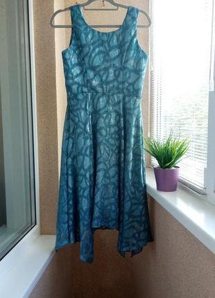 Красивое нарядное платье миди из фактурной ткани2 фото