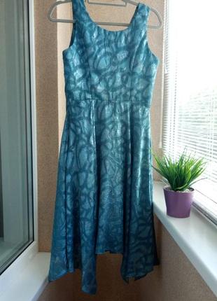 Красивое нарядное платье миди из фактурной ткани4 фото