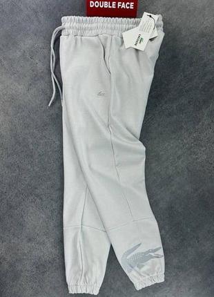 Брендові чоловічі штани/якісні штани lacoste  в сірому кольорі на кожен день3 фото